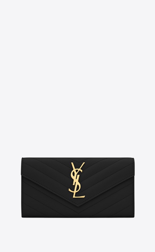 Monogram large flap wallet in grain de poudre embossed leather